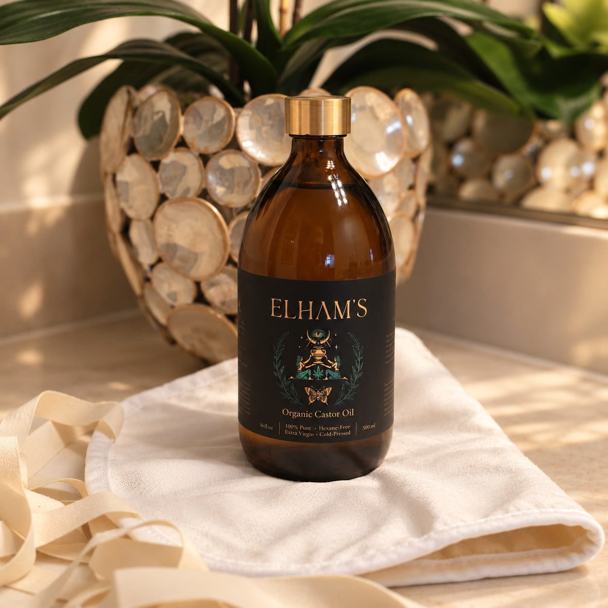 Elham's Castor Oil organic castor oil in an amber glass bottle